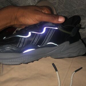 These are adidas zero 2 black glow in the dark rim size 9/